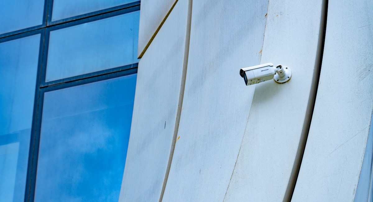 Surveillance camera mounted on a commercial building